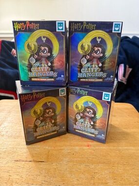 Warner Bros. Harry Potter Cliff Hangers Figurine Set - Gold, Blue (Lot of 4)